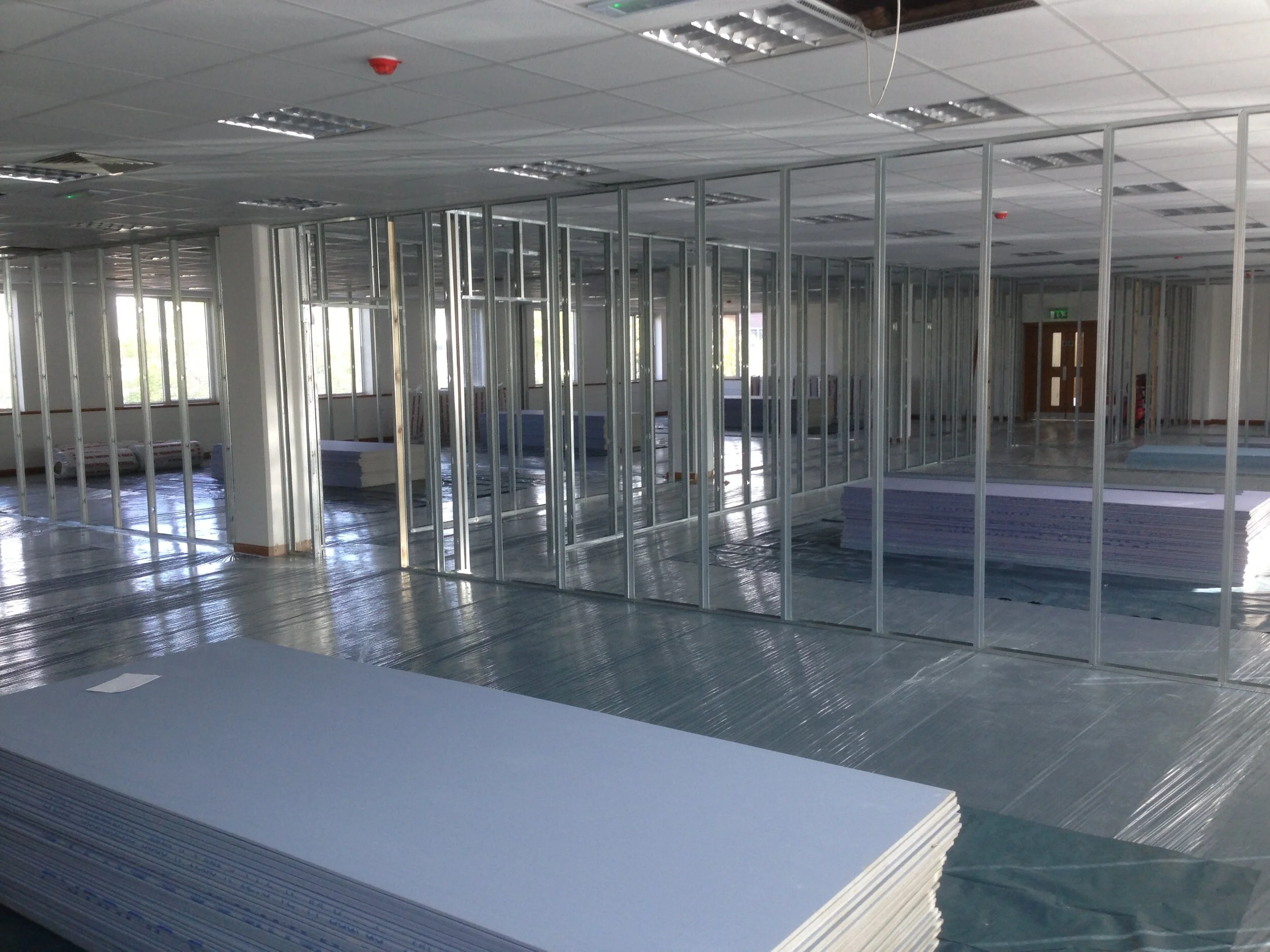 OPI London office — glazed partitions and ceilings